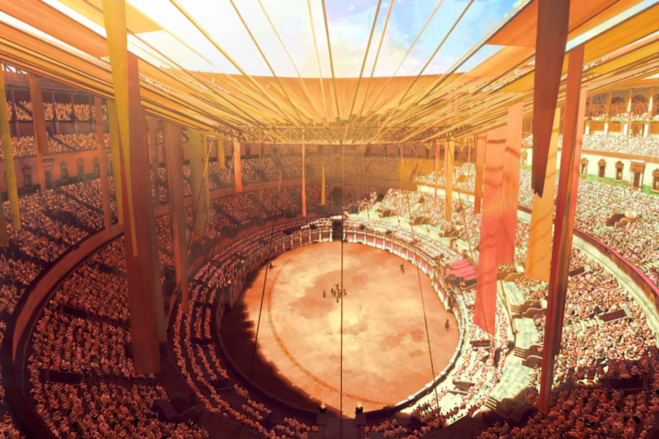 A large, circular arena filled with spectators under a partially covered roof, with a group of people in the center.