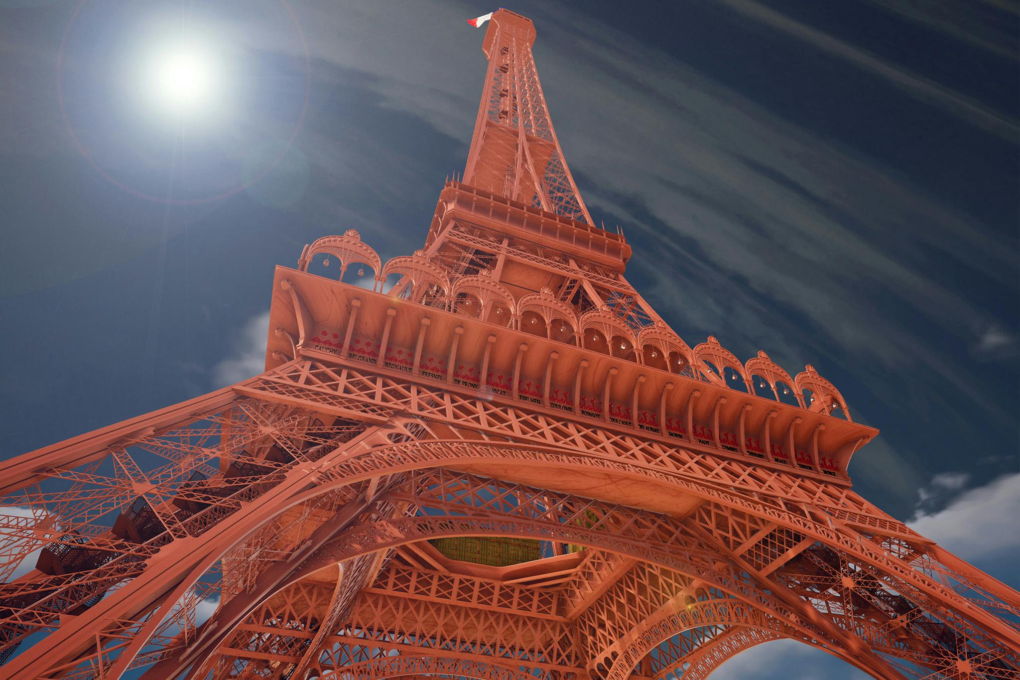 Vista dall'alto della Torre Eiffel in un cielo diurno, con effetti di lens flare e una piccola bandiera francese in cima.