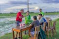 Enjoy watching the sunset over the rice fields with some cold drinks to end your evening tour.