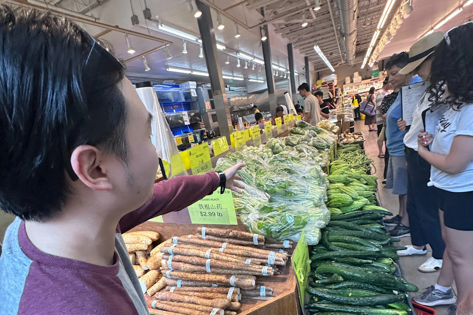 Pointing out produce at local grocery store