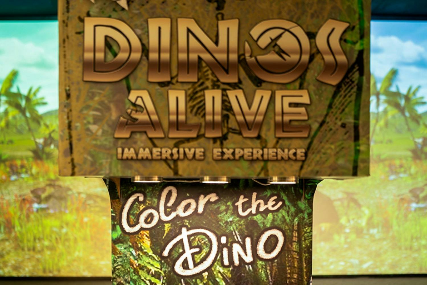 Signage reading "Dinos Alive: Immersive Experience" and "Color the Dino" with a dinosaur-themed background.