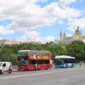 A Big Bus Tour passing the Royal Palace in Madrid