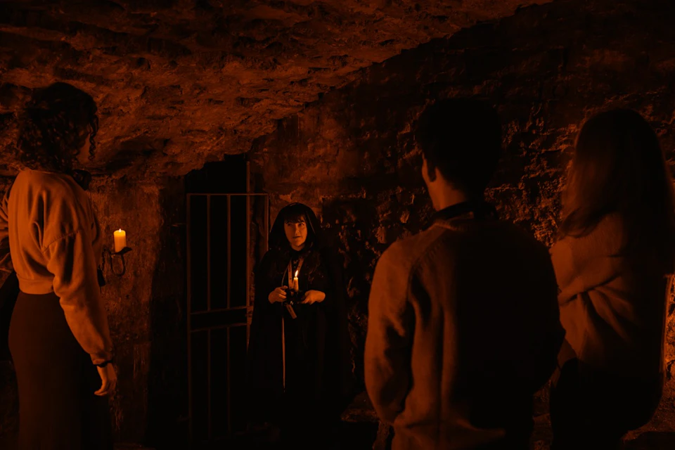 Mercat Tours Storyteller in Underground Vaults with visitors