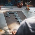 Find out why you can't join a dominoes game and play with locals even if you want to