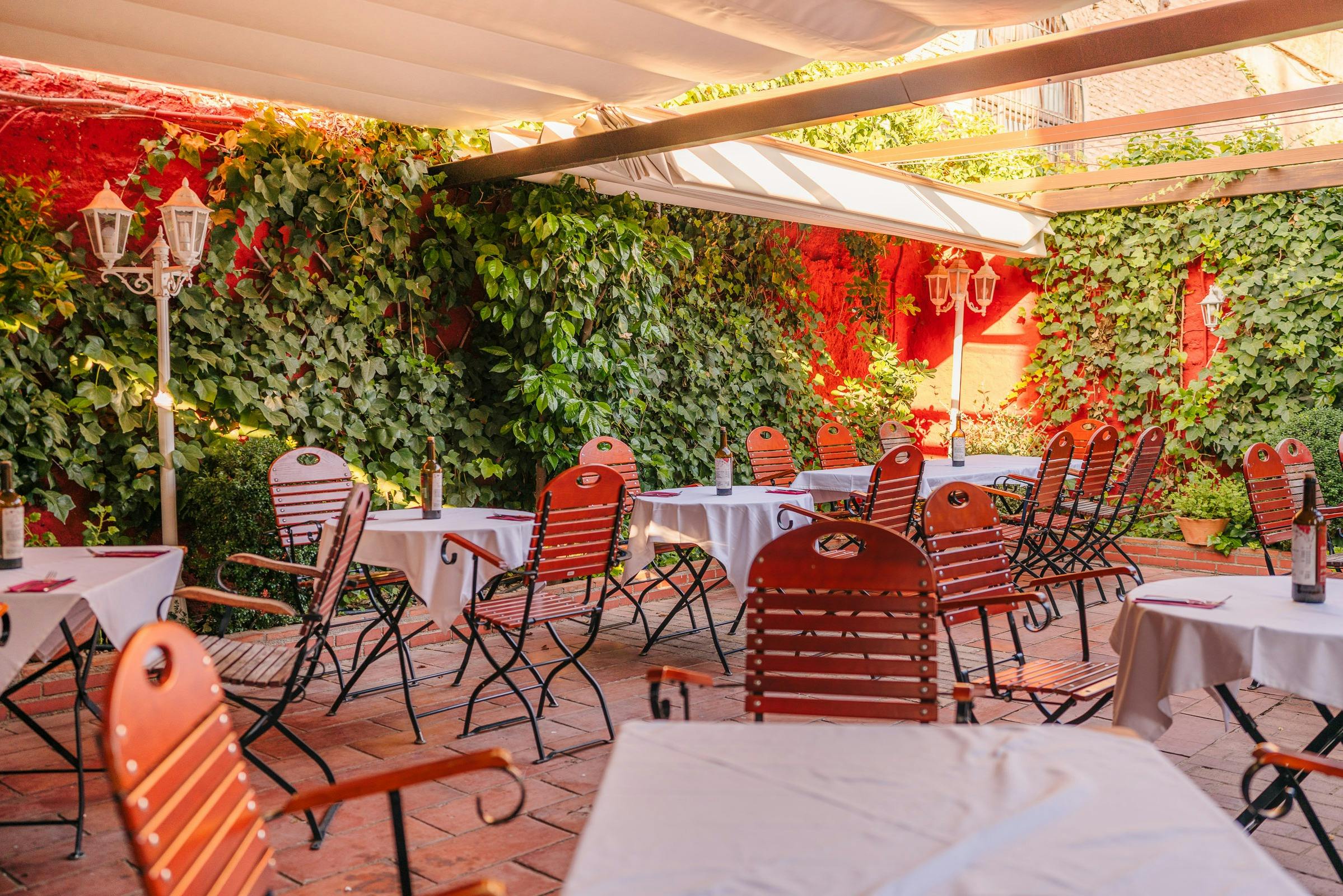 Tables on the terrace, under the awning