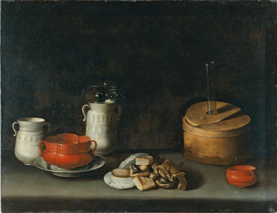 A still life featuring various vessels, a red bowl on a plate, a white jug, a golden container, and a plate of assorted snacks.