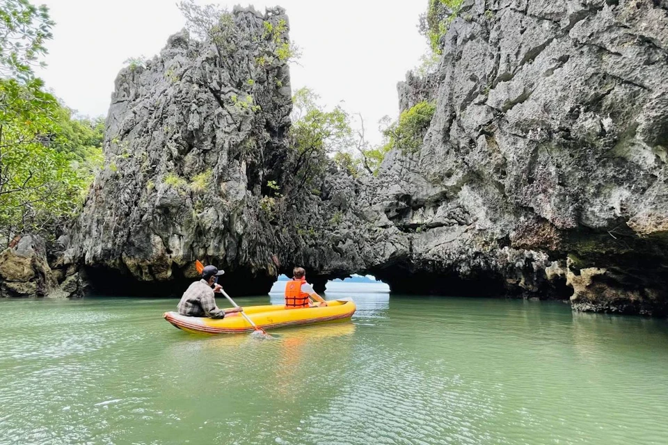 Enjoy serene canoeing experiences at Talu Island.