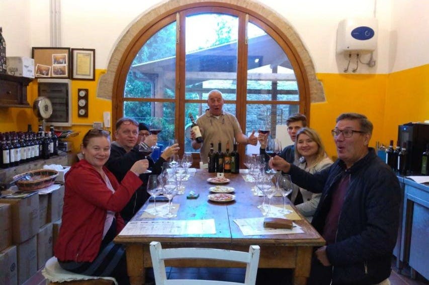 Guests participating in a wine tasting in the Chianti region.