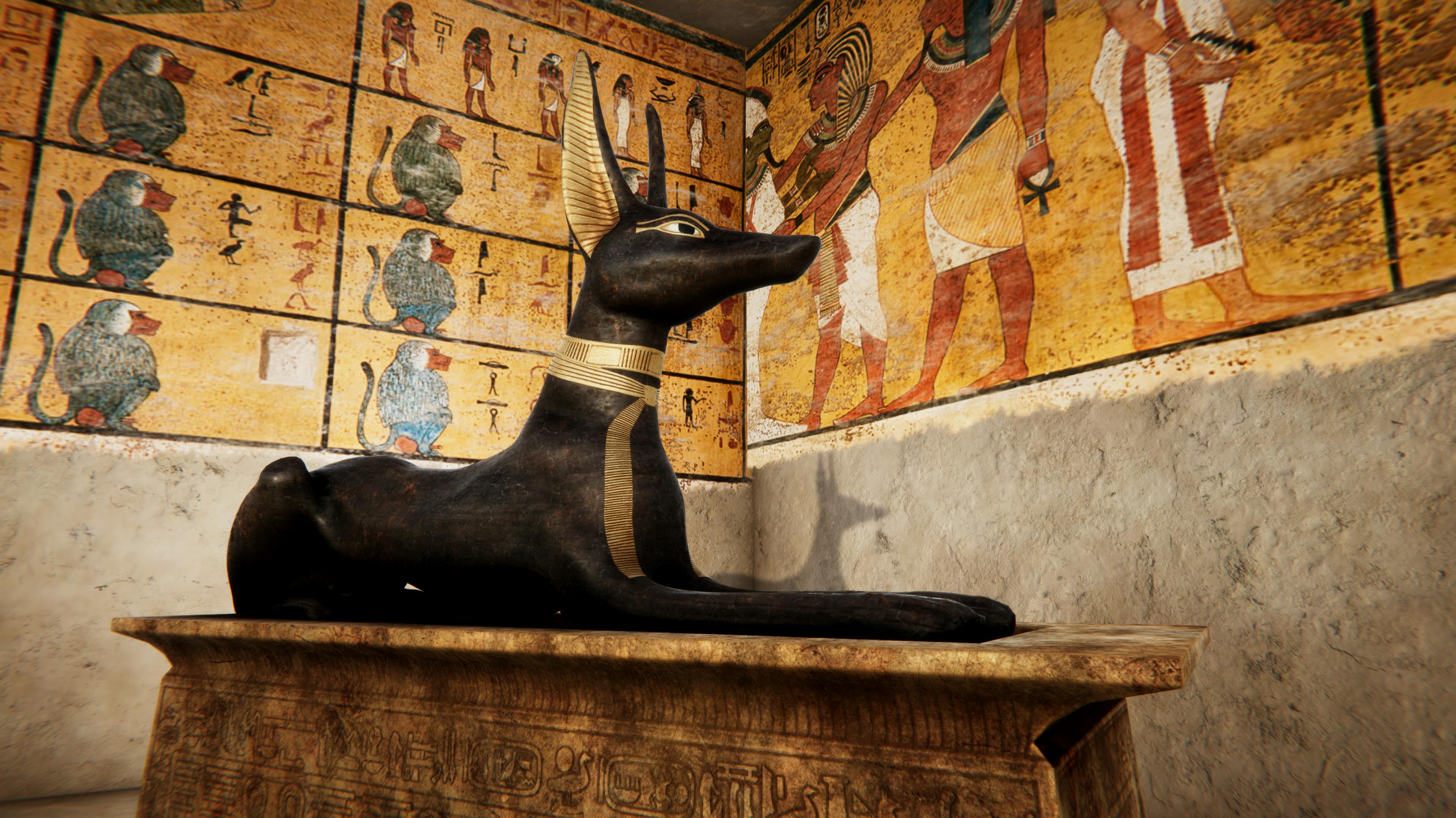 An ancient Egyptian room with Anubis statue on a pedestal, surrounded by detailed wall paintings of human and animal figures.