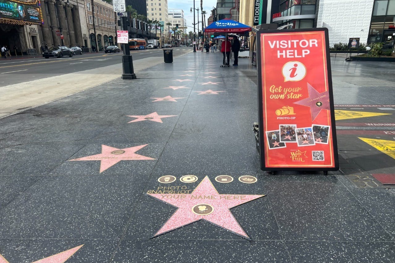 Hollywood Walk of Fame area features a replica star for taking photos, a "Visitor Help" and your own personalized star photo 