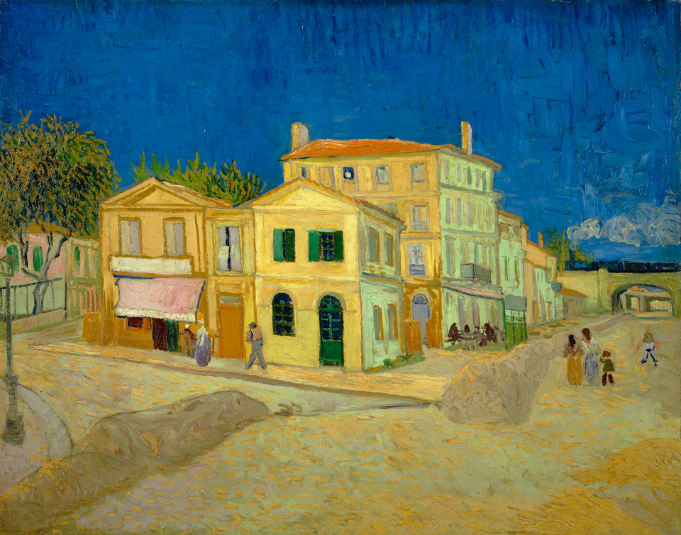 A painting of a yellow house under a deep blue sky, with people walking on a wide street in the foreground.
