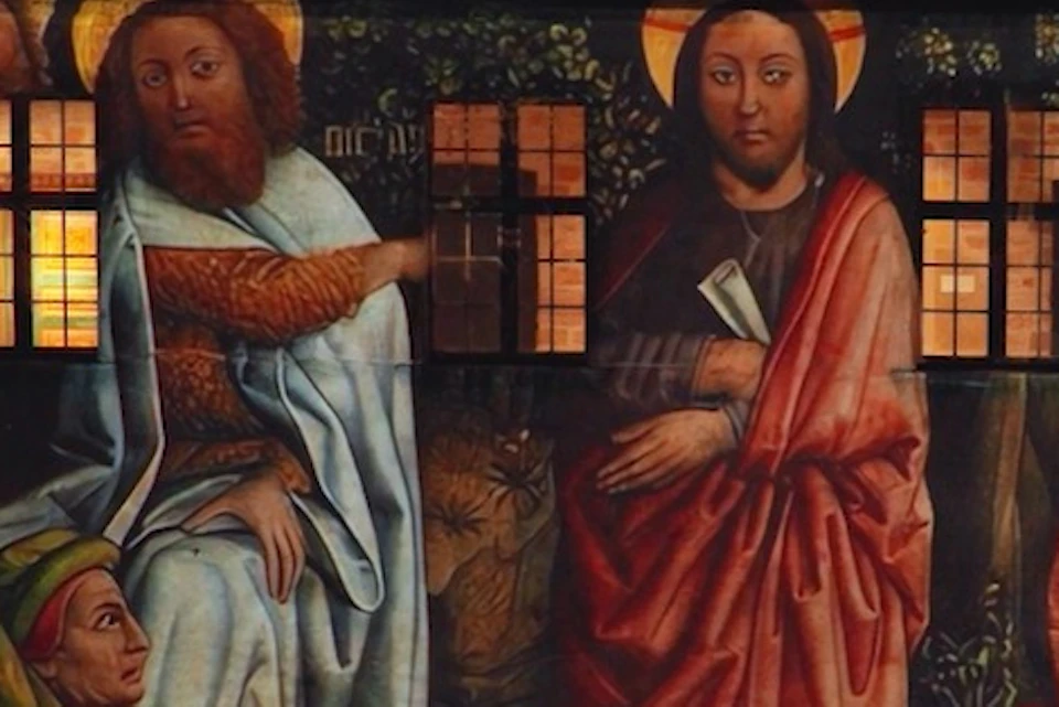 A projection of a Renaissance-style artwork depicting biblical scenes on a building facade at night.