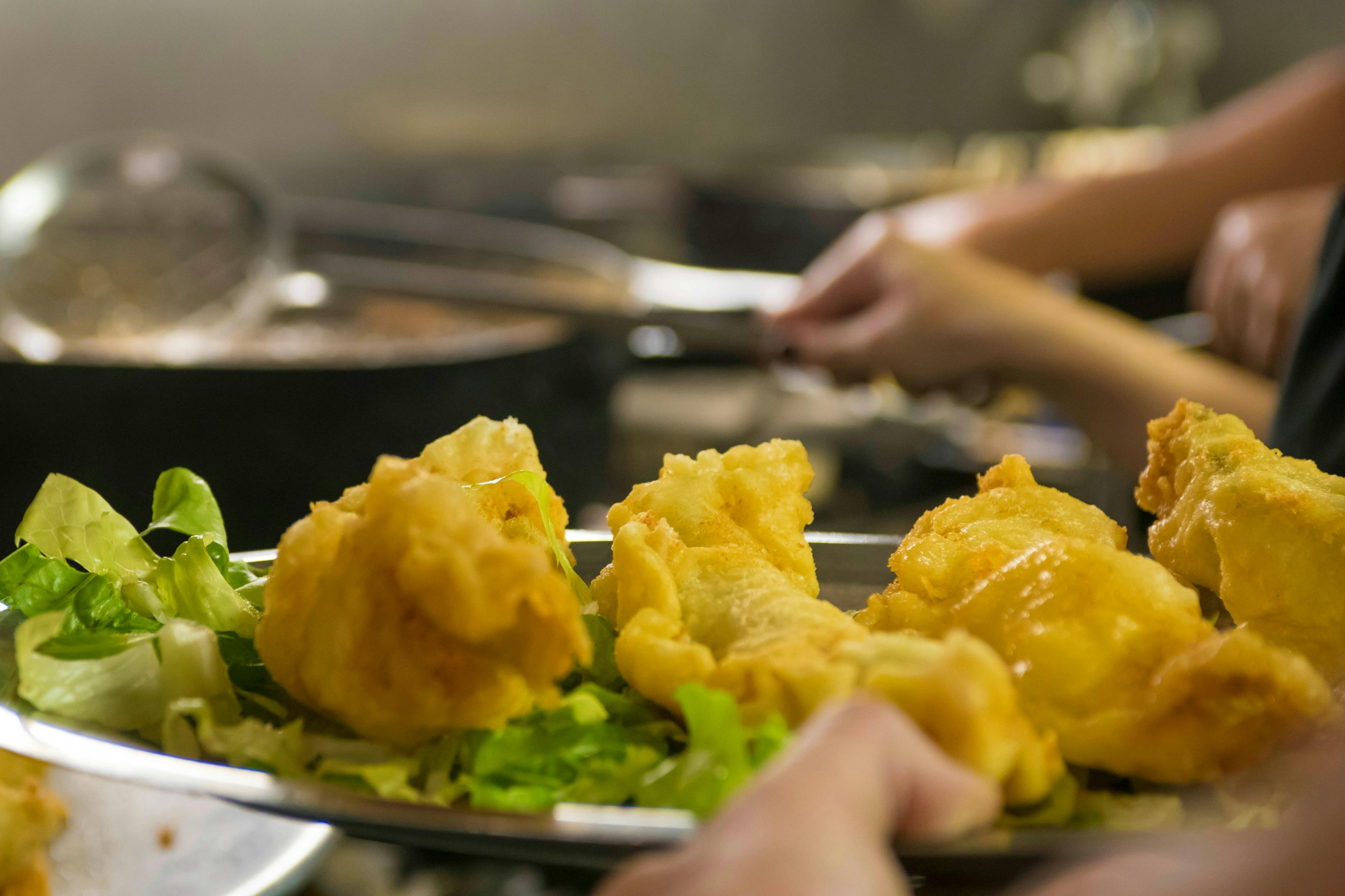 Taste the famous Roman specialty - 'baccalà fritto' (lightly fried fish).