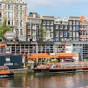 View of canal houses from the Amstel River