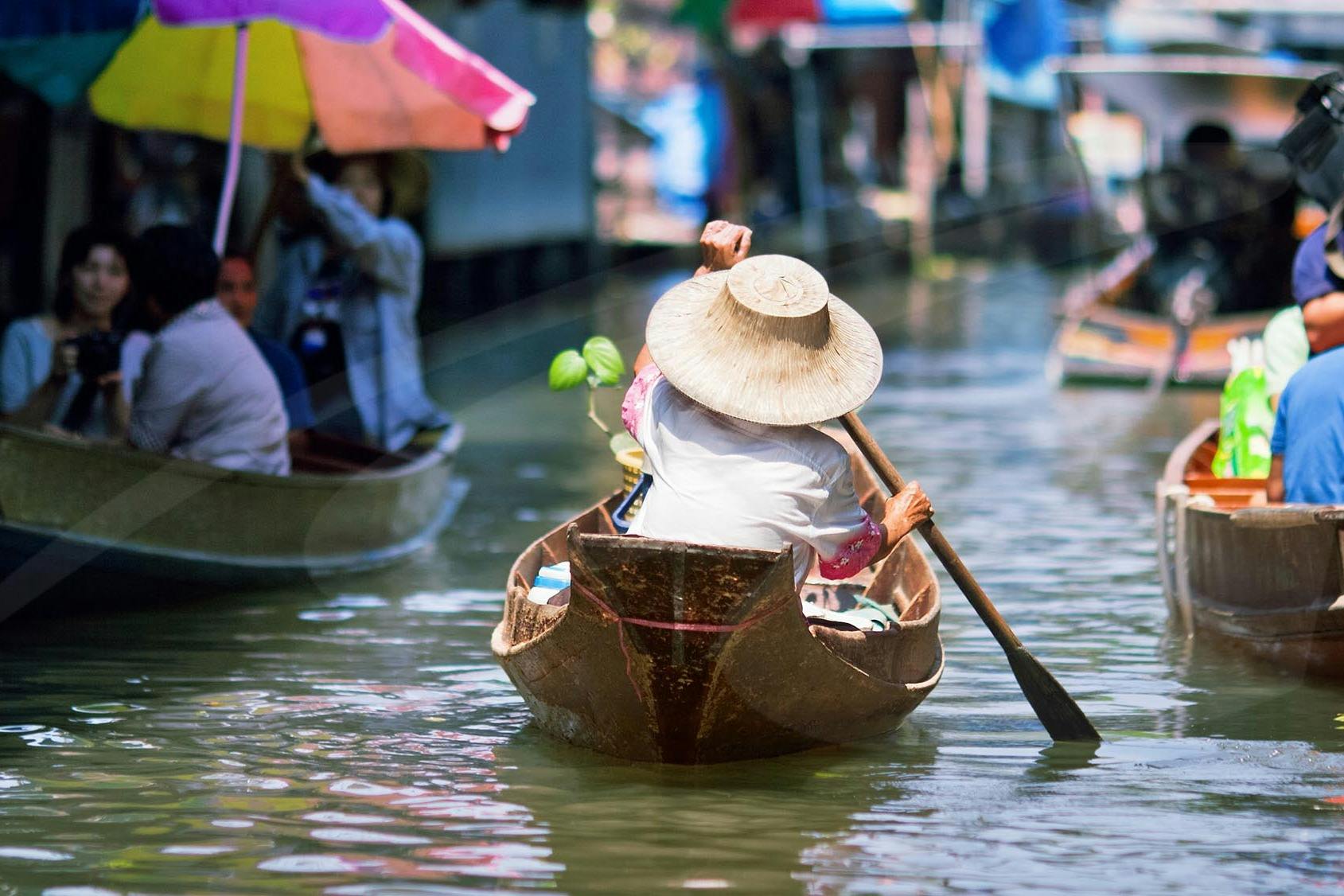 A paddle boat may be used to visit the market in a more traditional way.