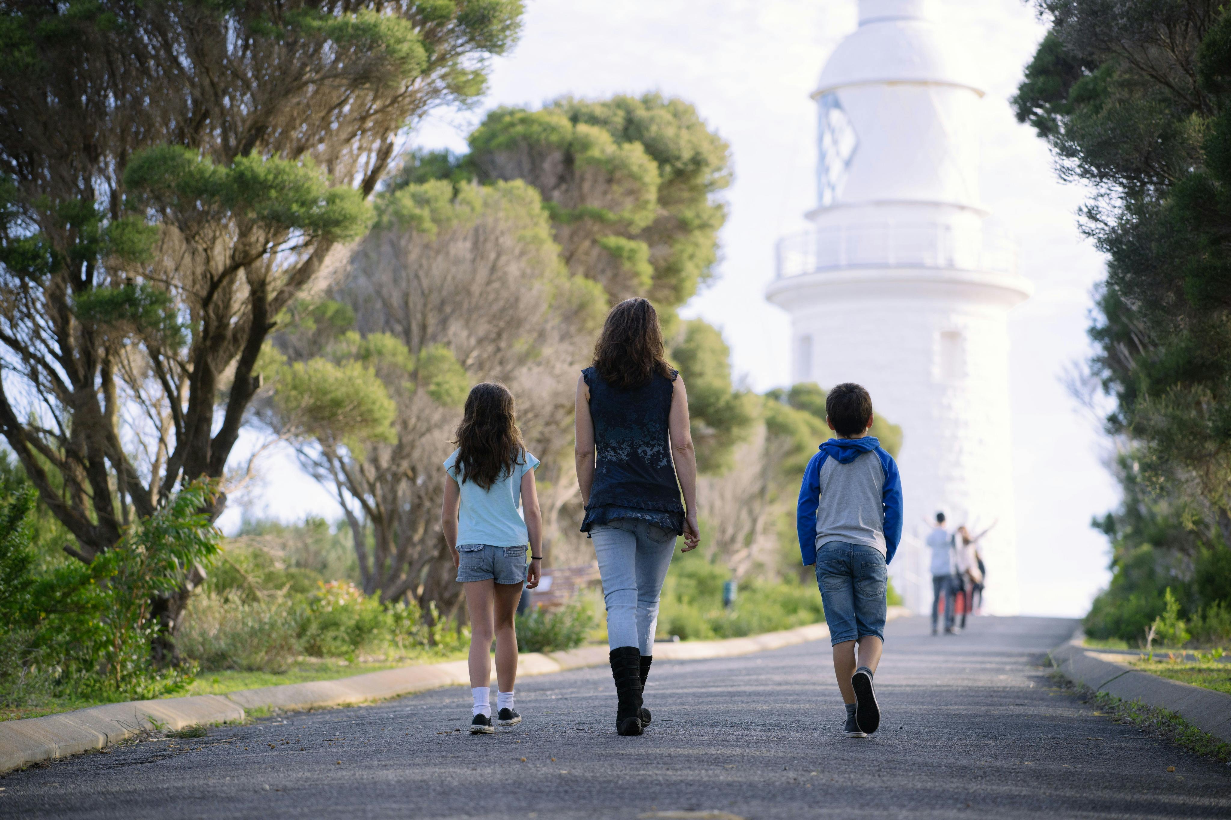 Visitors walking towards Cape Naturaliste Lighthouse