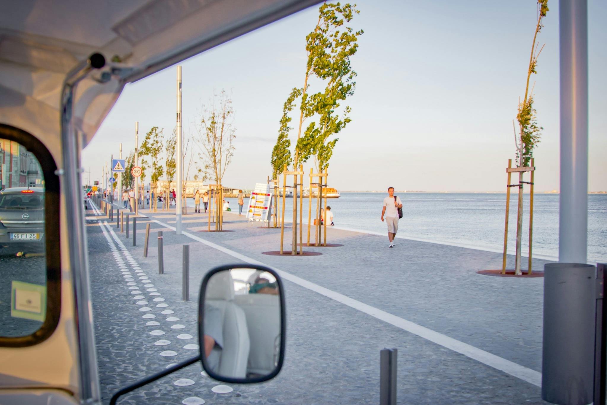 Tourists on a tuk tuk guided tour in Lisbon
