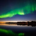 Northern Lights dancing in the sky above Lapland