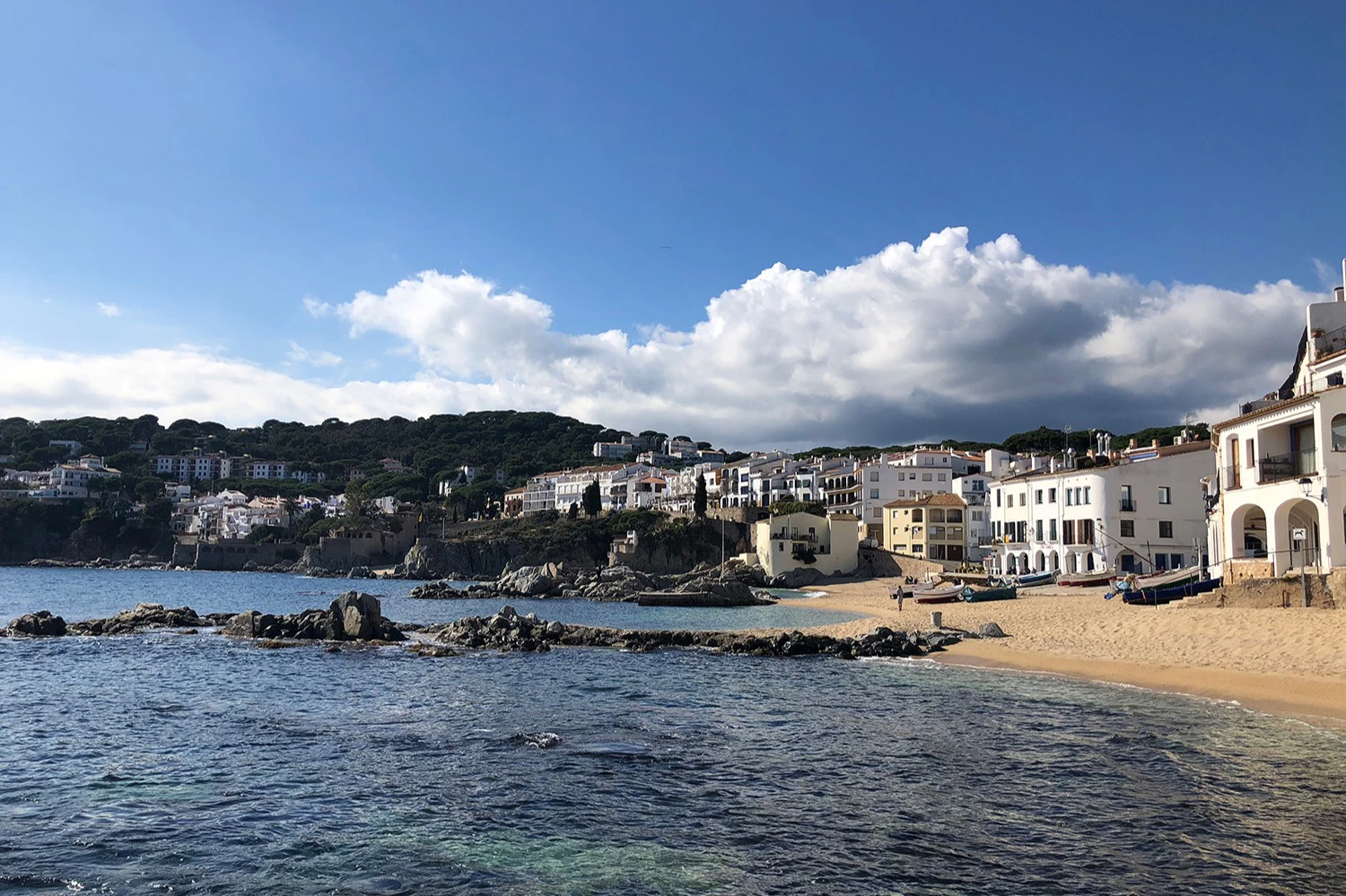 White washed houses and beautiful beaches in Calella on our Girona and Costa Brava Tour.