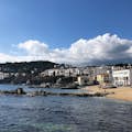 White washed houses and beautiful beaches in Calella on our Girona and Costa Brava Tour.