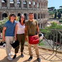 Our guide explains the Colosseum from the outside.