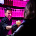 Bartender giving a cocktail