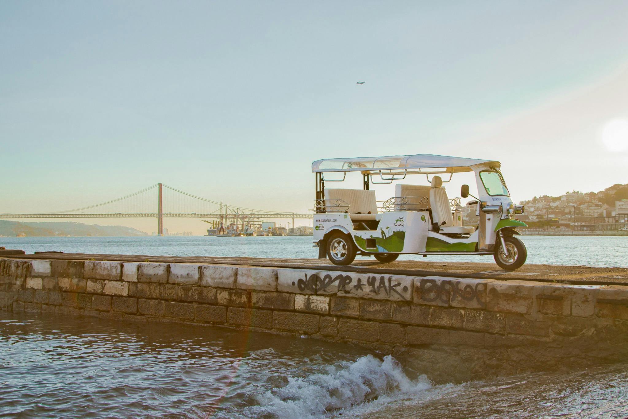 Tourists on a tuk tuk guided tour in Lisbon