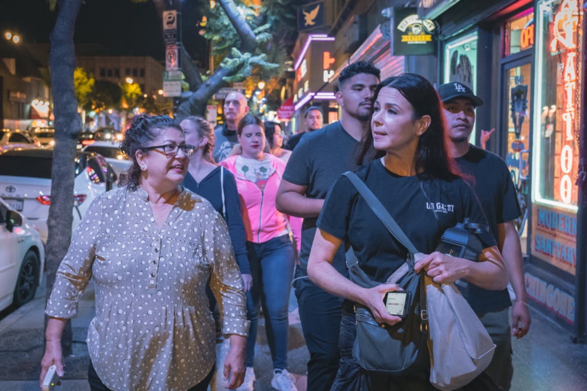 Tour guide and guest enjoying the ghost tour.
