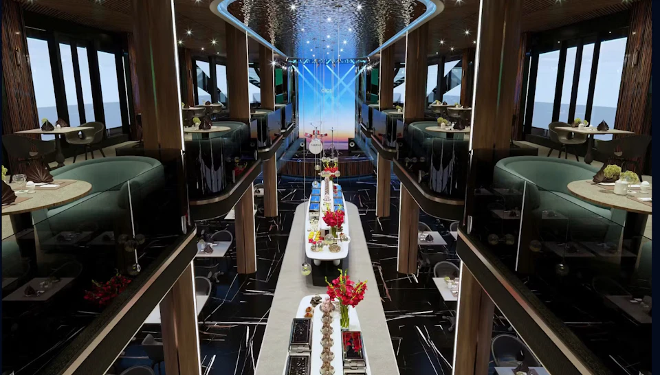 Luxurious double-deck dining area with modern decor, a long buffet table with food and flowers, and ambient lighting.