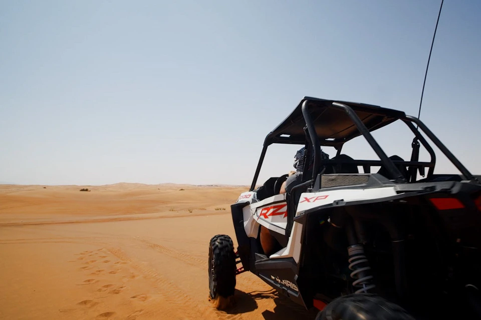 Conquer the desert in a powerful 1000cc dune buggy, effortlessly gliding over towering dunes for an adrenaline-packed ride.