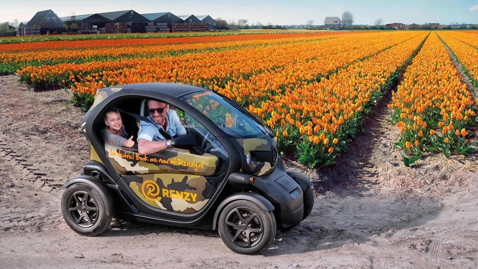 photo of car with flower field