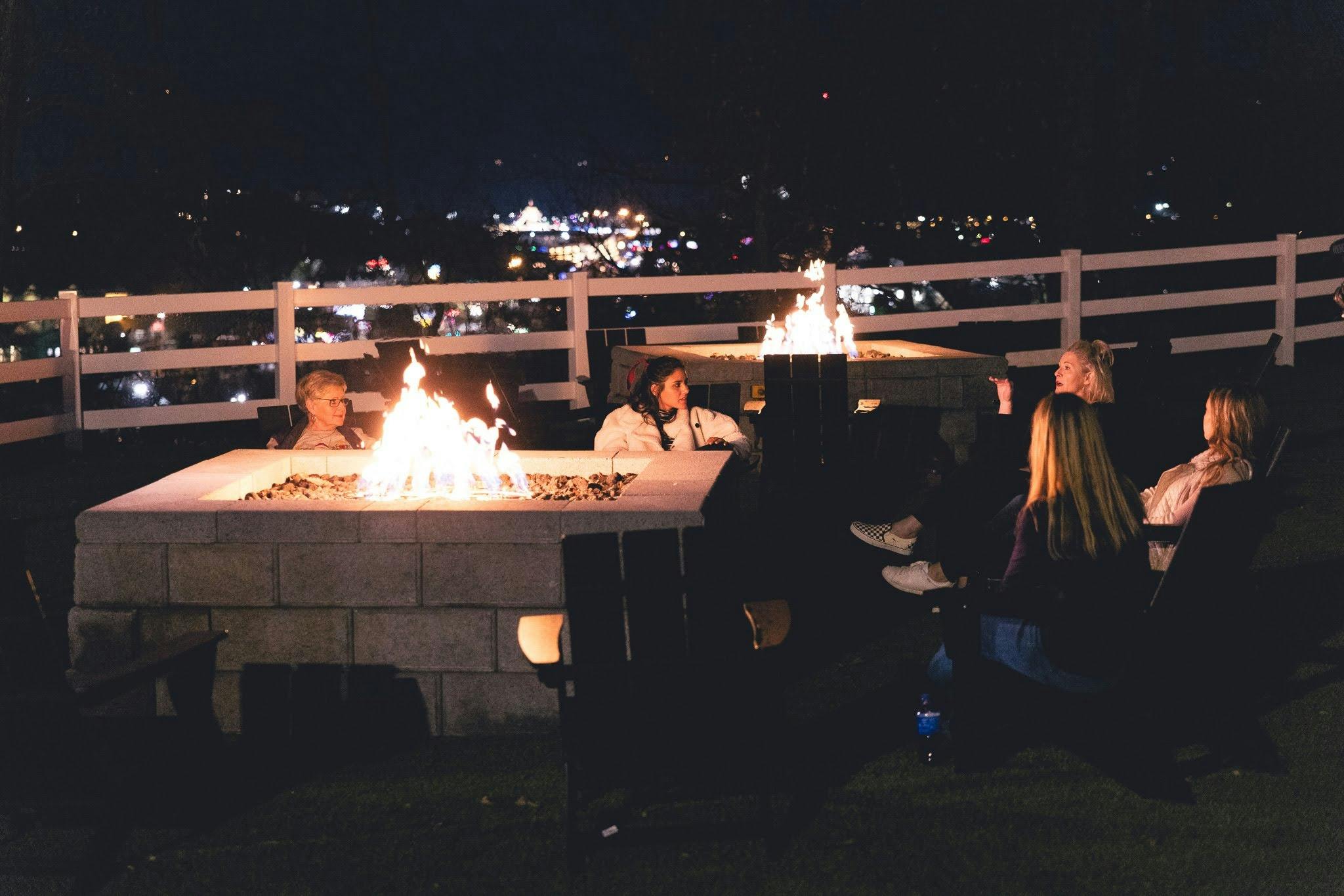 Guests enjoying the amazing views by our cozy firepits