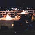 Guests enjoying the amazing views by our cozy firepits