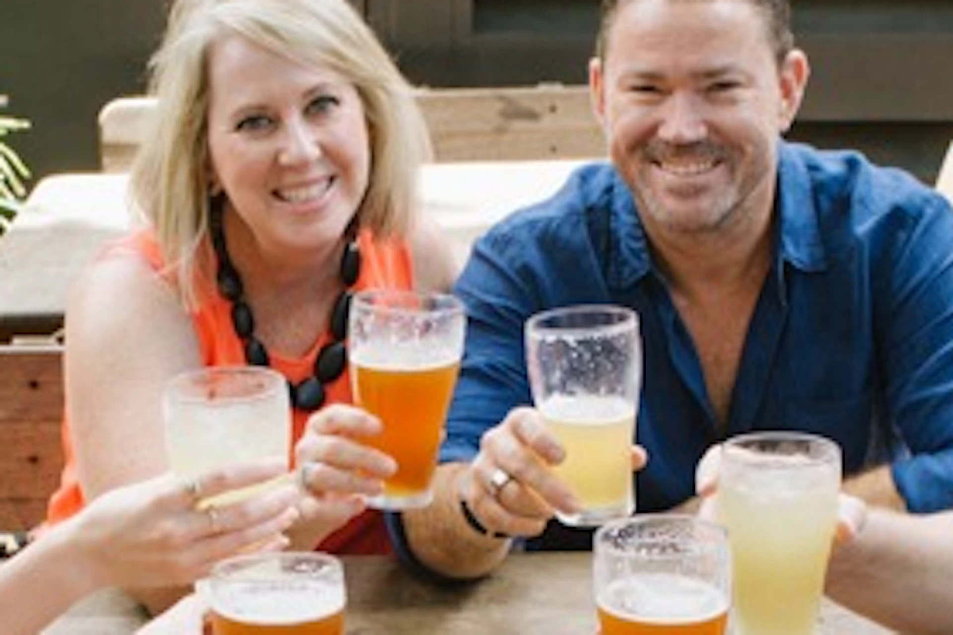 A group of guests enjoying a drink at a local pub