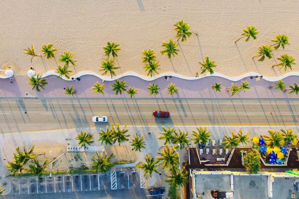 Aerial photo of a road by the beach