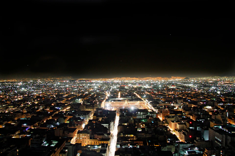 EAST of Mexico City. Mexico City's Zocalo, National Palace, Metropolitan Cathedral.