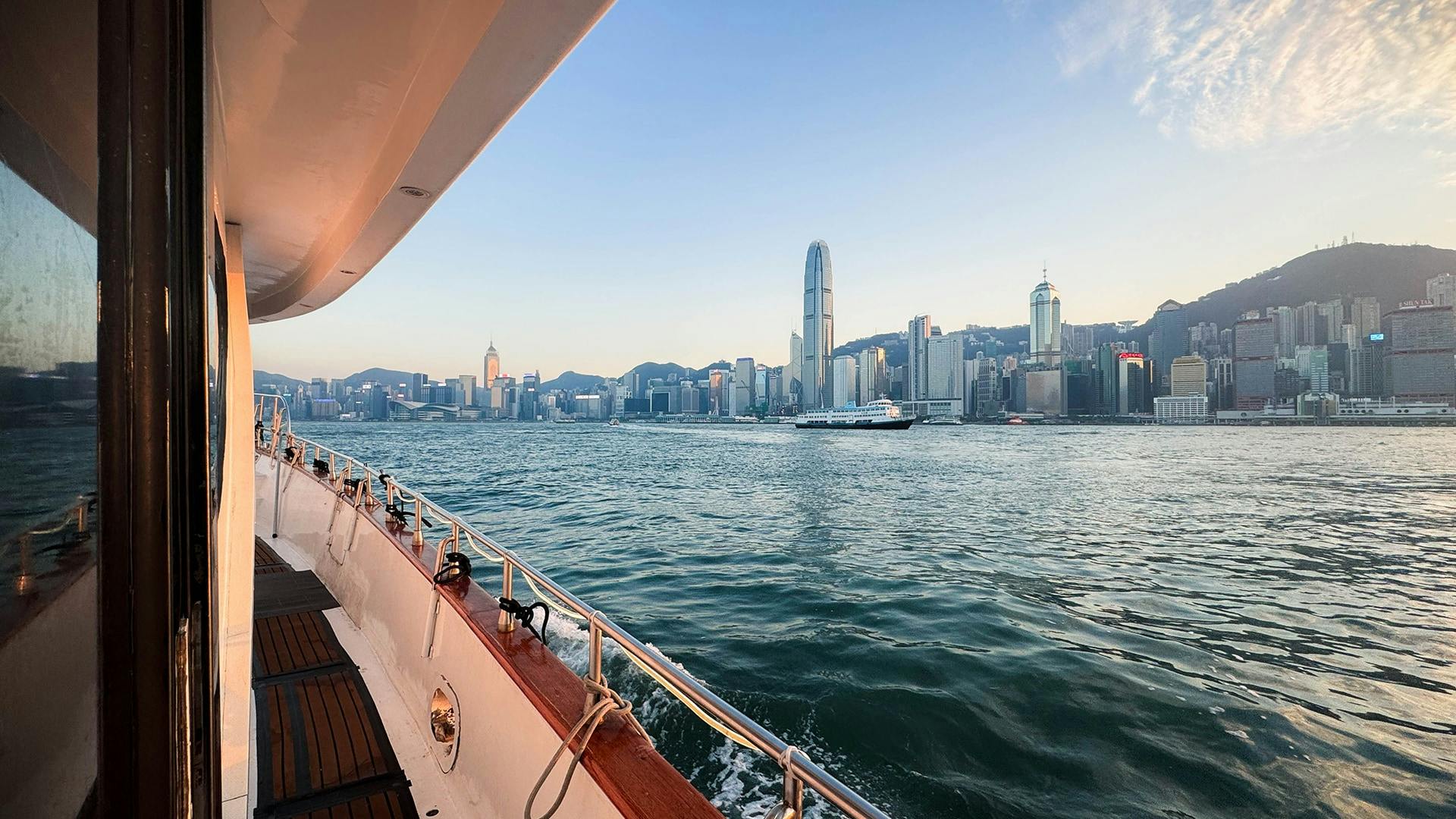 Victoria Harbour: 1-Hr Night Cruise Dreamer with Unlimited Snacks + Drinks in Hong Kong – Tiqets