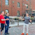 On Trinity Street learning about the history of the Distillery District. 