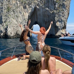 Capri: Sunset Boat Tour with Drinks Sail at sunset and enjoy Prosecco and limoncello on board