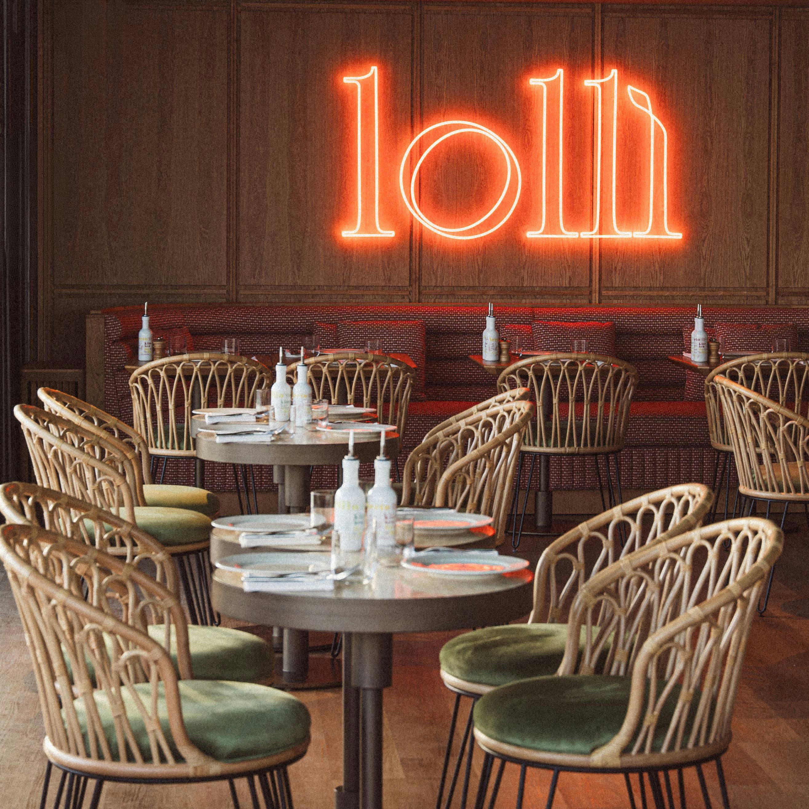 Un ristorante accogliente con sedie in legno, tavoli rotondi e un'insegna al neon "lolli" sulla parete.