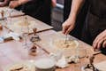 Cours de fabrication de pâtes : Cuisiner, dîner et boire du vin avec un chef local