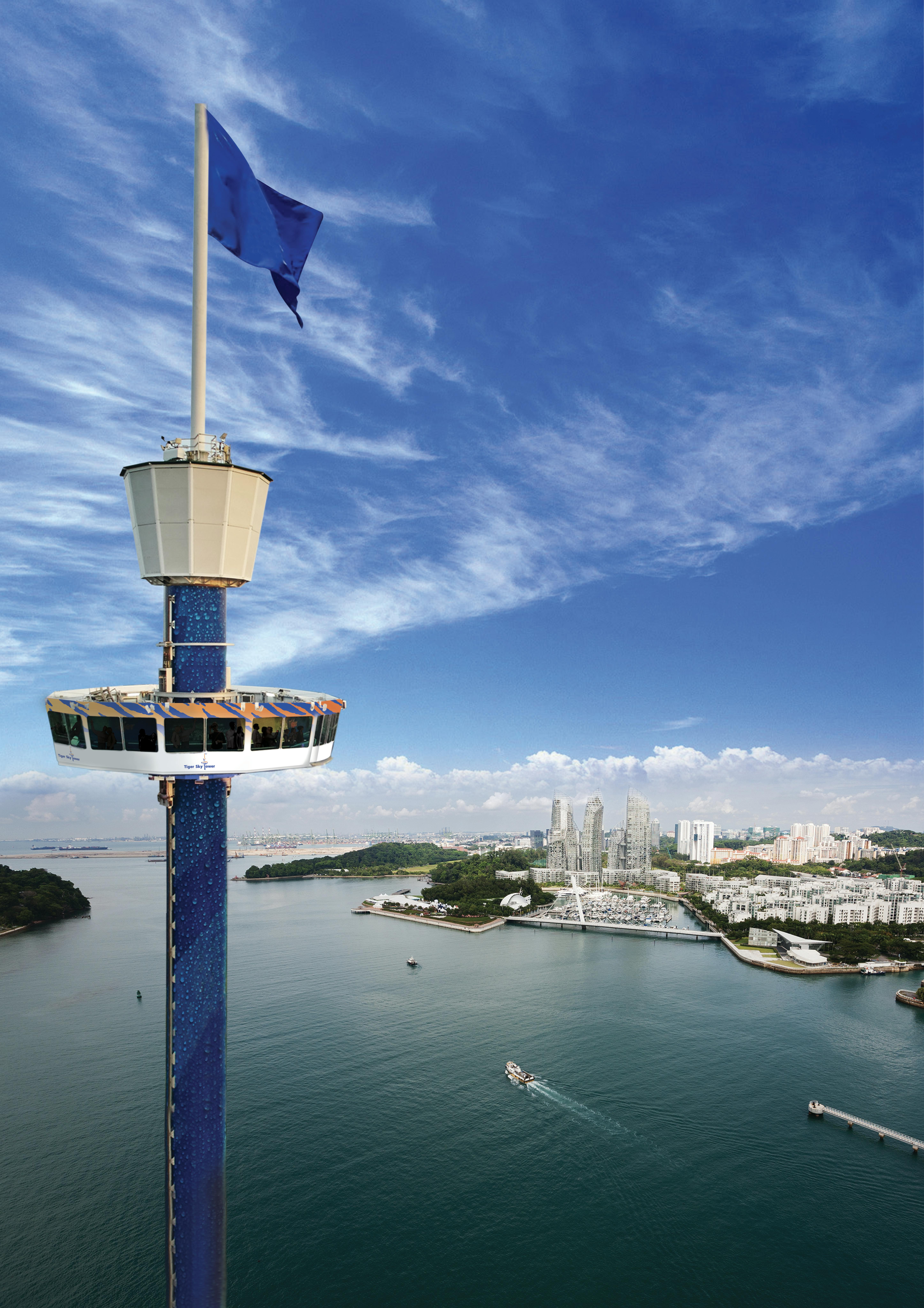 Observation tower with viewing deck over water, cityscape, and greenery under a blue sky with scattered clouds.