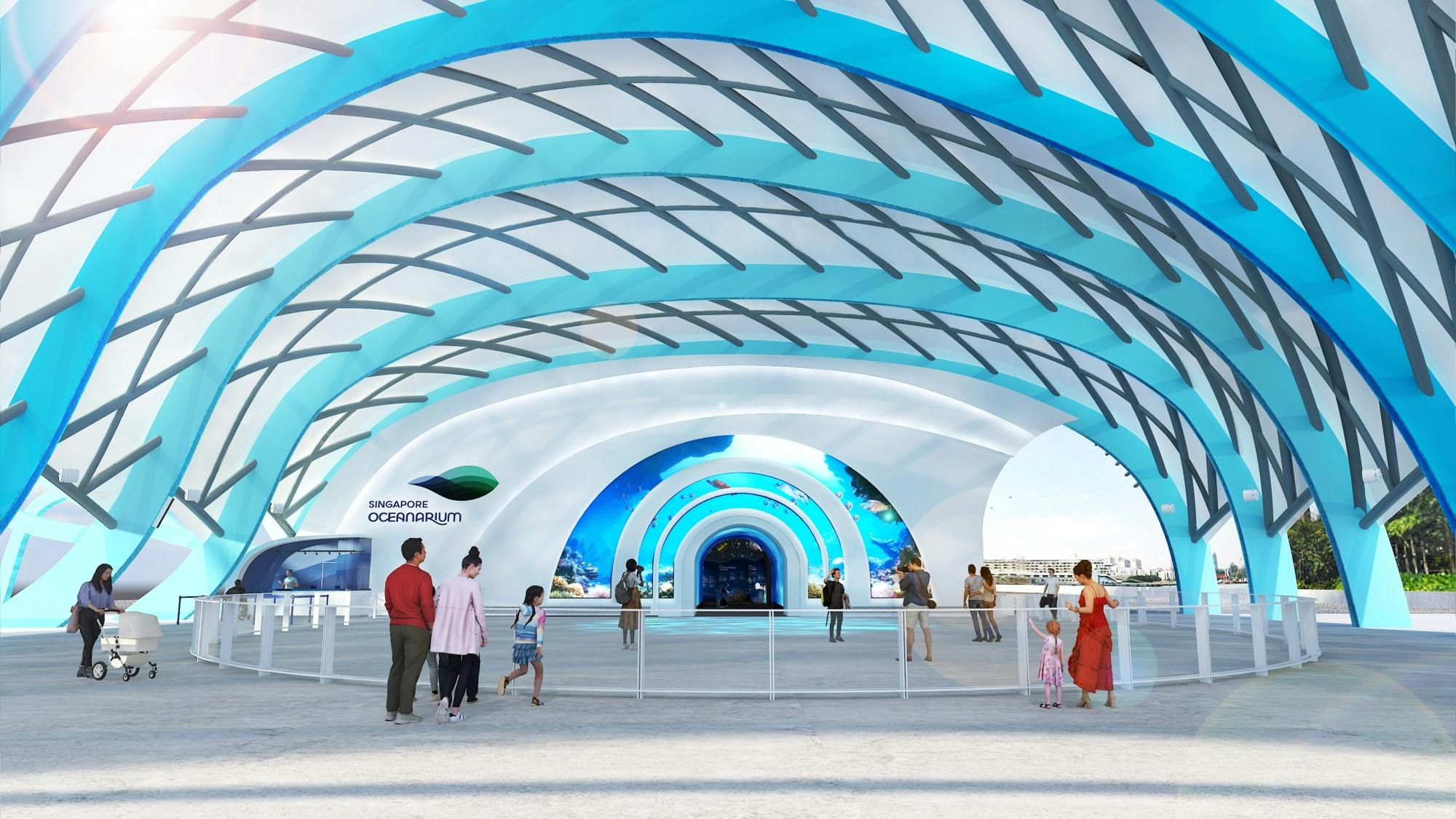「シンガポール海洋水族館」の看板と水族館の入り口がある、大きなモダンな青と白の天蓋の下に立っている人々。