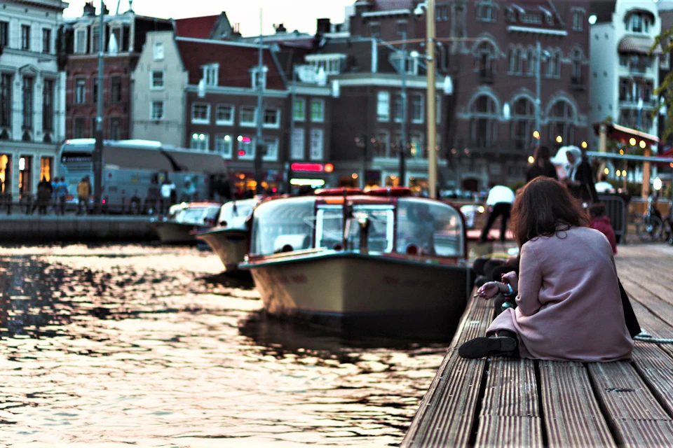 People enjoying nearby the water