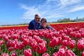 Se faire photographier dans l'un des champs de tulipes