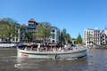 Open boot door de Amsterdamse grachten