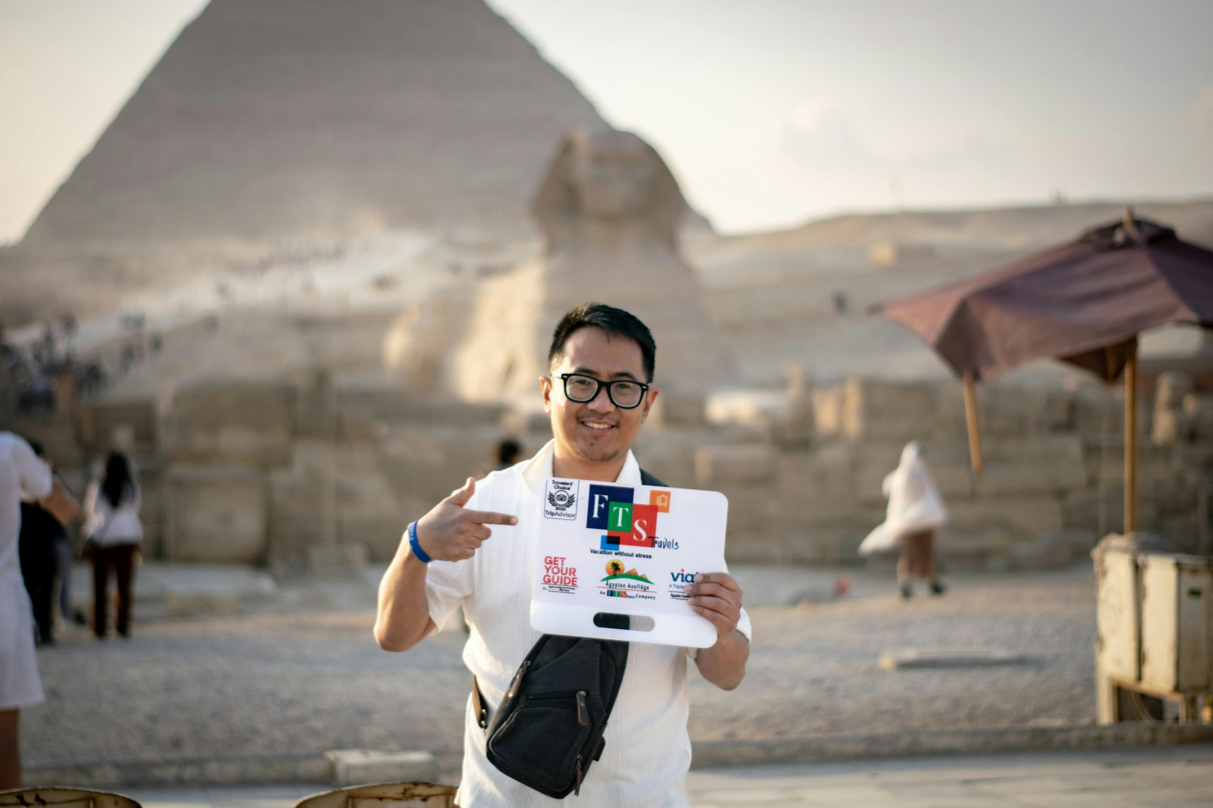 Half-day private Giza tour: Pyramids, Sphinx, camel ride, photos, hotel pickup & expert guide.