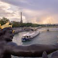 View of Captain Fracasse from Pont Alexandre III. View of the Eiffel Tower.