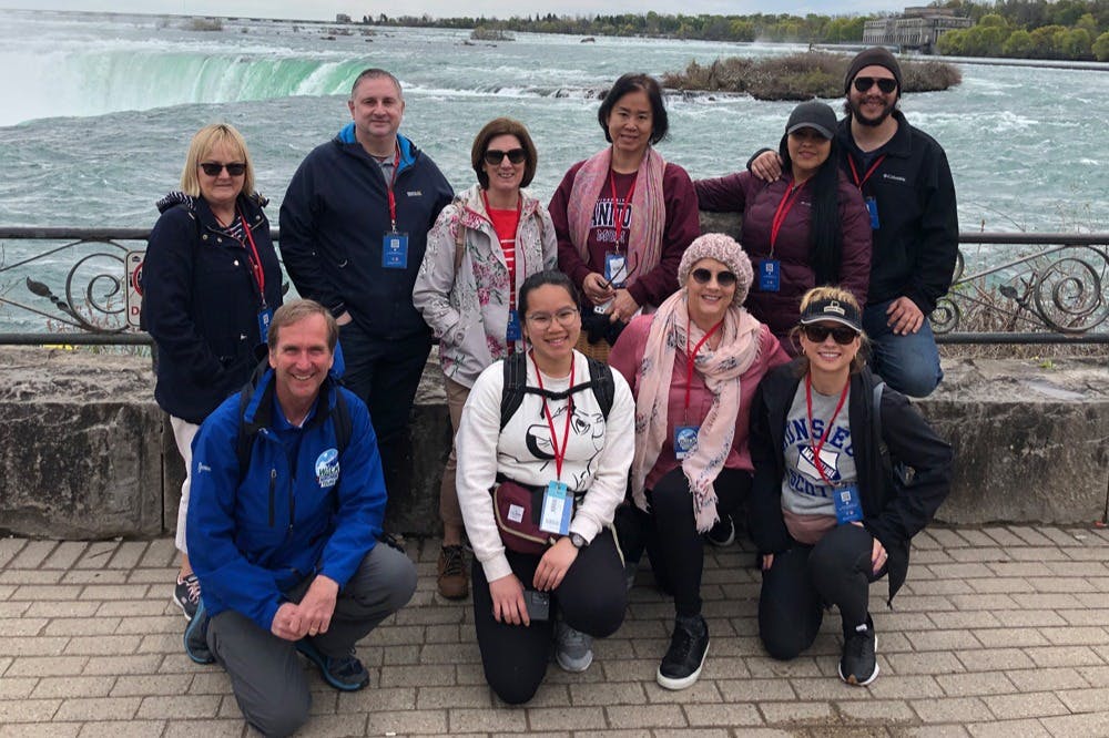 A group enjoying their tour of Niagara Falls