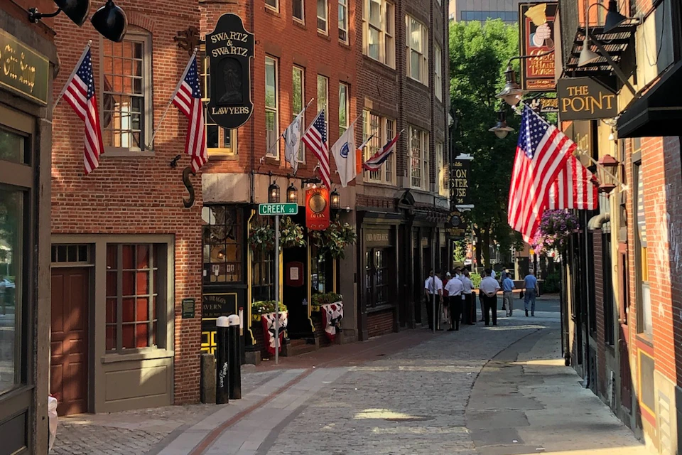 Venture down colonial-era lanes along beloved Tavern Alley in Boston's historic Blackstone Block